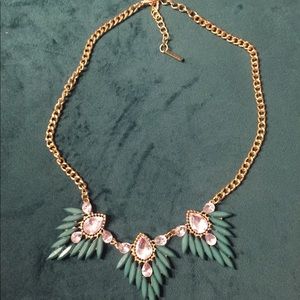 Gold and green statement necklace.